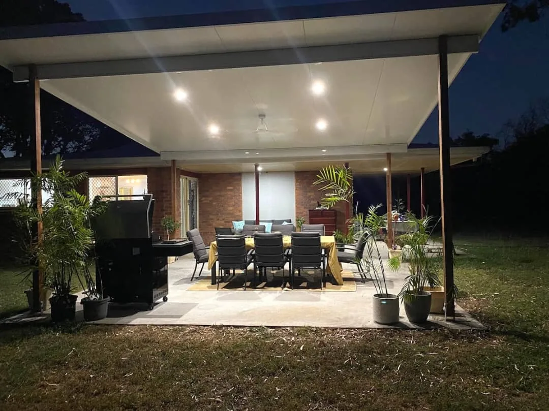Illuminated patio pavilion at night